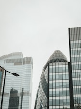 A minimalist London cityscape emphasizing residential buildings under calm skies.