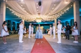 Snapshot of a formal gala event with guests dressed elegantly in a grand ballroom