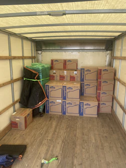Protective wrapping materials cushioning fragile goods inside a logistics truck