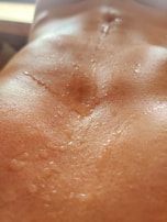 Close-up of sweat-resistant Ironfits fabric detailing on a training shirt.