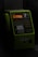 A green public telephone booth with a numeric keypad and a slot for a telephone card. The lighting is dim, giving the telephone a dark and slightly retro appearance. The phone has buttons with numbers, symbols and instructions written in Japanese. An orange display screen can be seen in the middle part, above the keypad. The handset is placed on the left side of the phone.