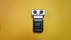 Close-up of the TH6140 temperature and humidity recorder with glowing orange accents