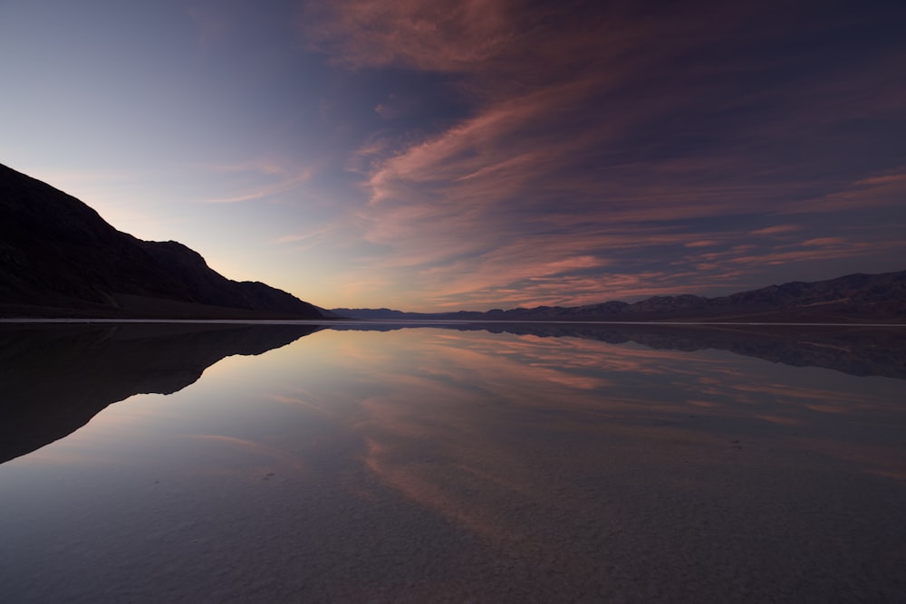 a large body of water surrounded by mountains