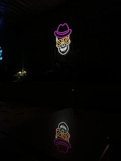 A glowing neon red skull icon on a dark background, symbolizing ethical hacking.