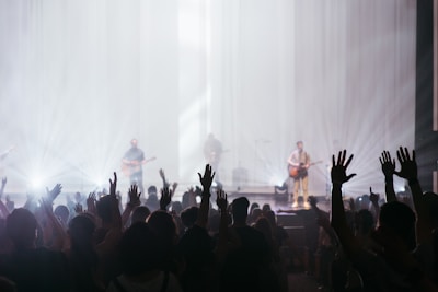 A crowd enjoying a live performance of the musical.