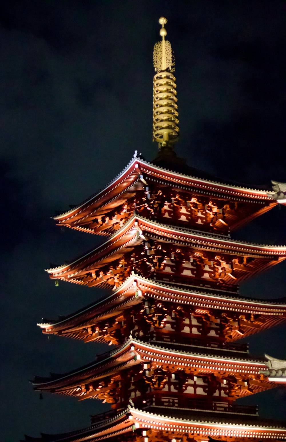 a tall tower with a clock on top of it