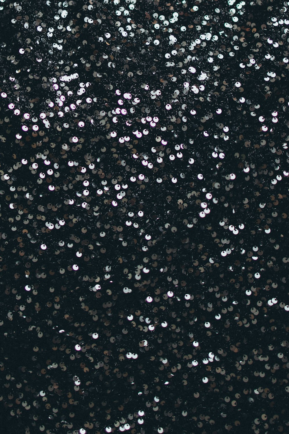 a black background with a lot of white dots