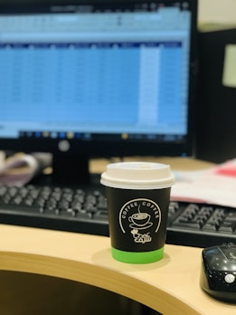 A calm office scene with charts and a coffee cup, focusing on productivity tools.