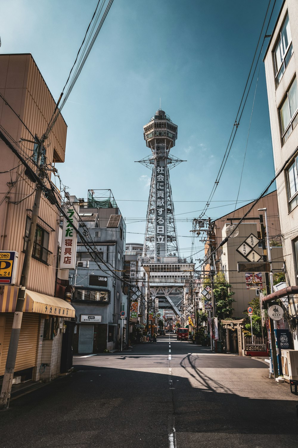 a street with a tower in the middle of it