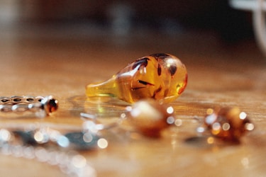 a close up of a bunch of beads on a table