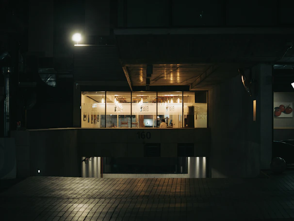 A friendly customer service team working late at night in a modern office.