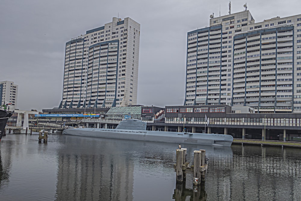 a large boat sitting in the middle of a body of water