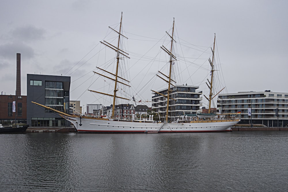 a large white boat floating on top of a body of water