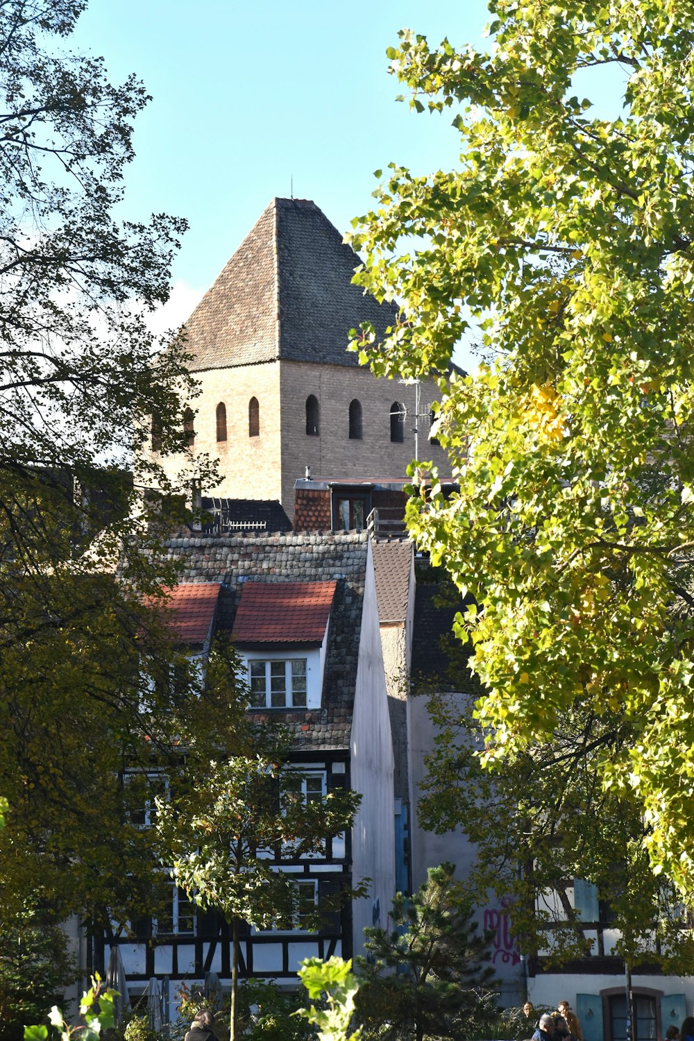 a tall building with a clock on the top of it