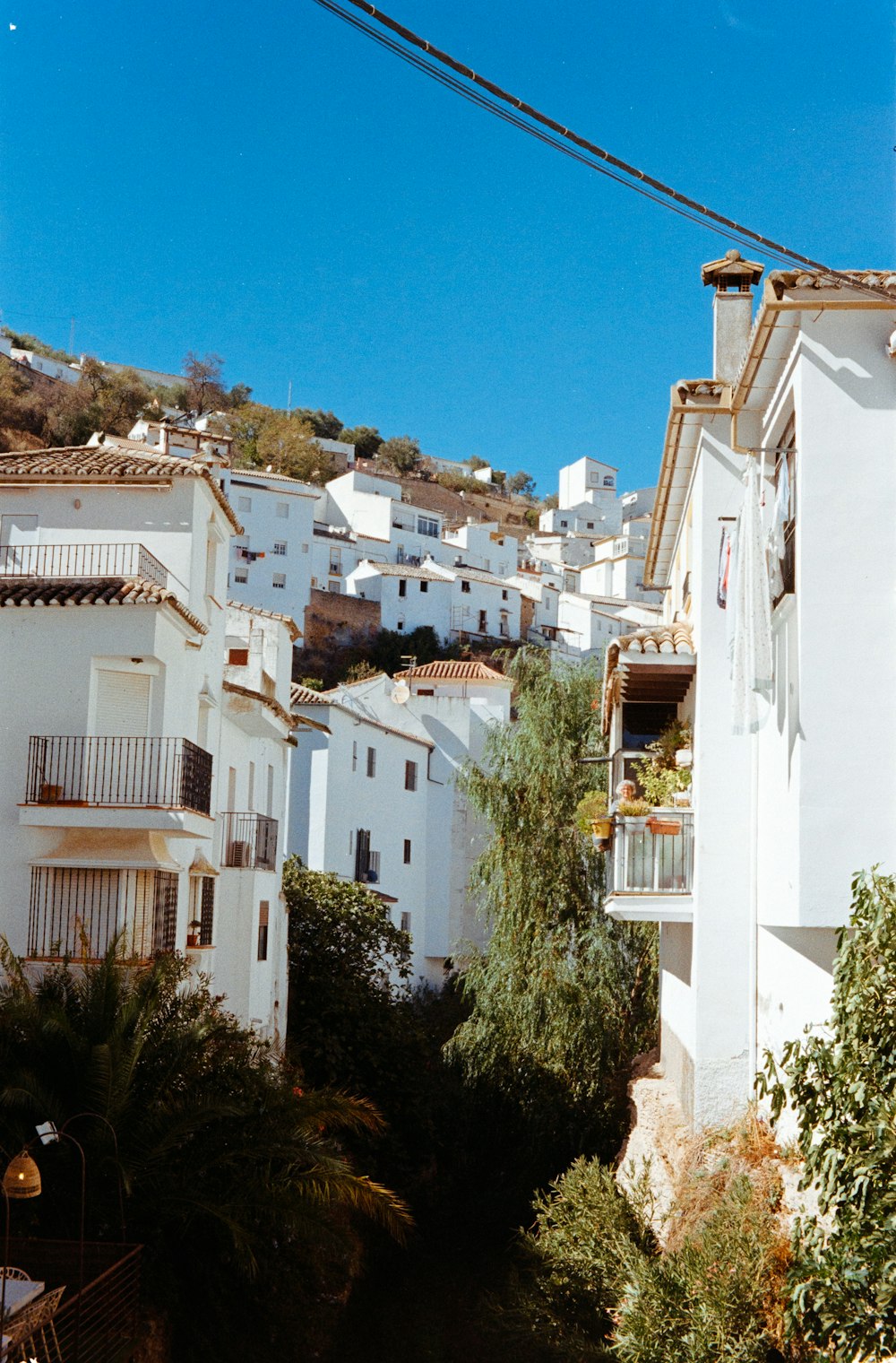 a view of a city with white buildings