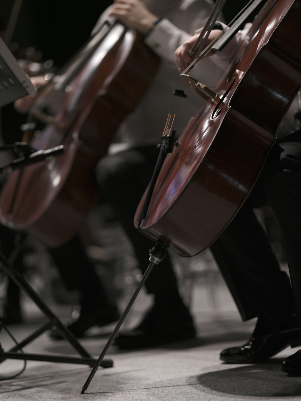 a group of people playing musical instruments on stage