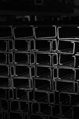 a stack of steel bars stacked on top of each other