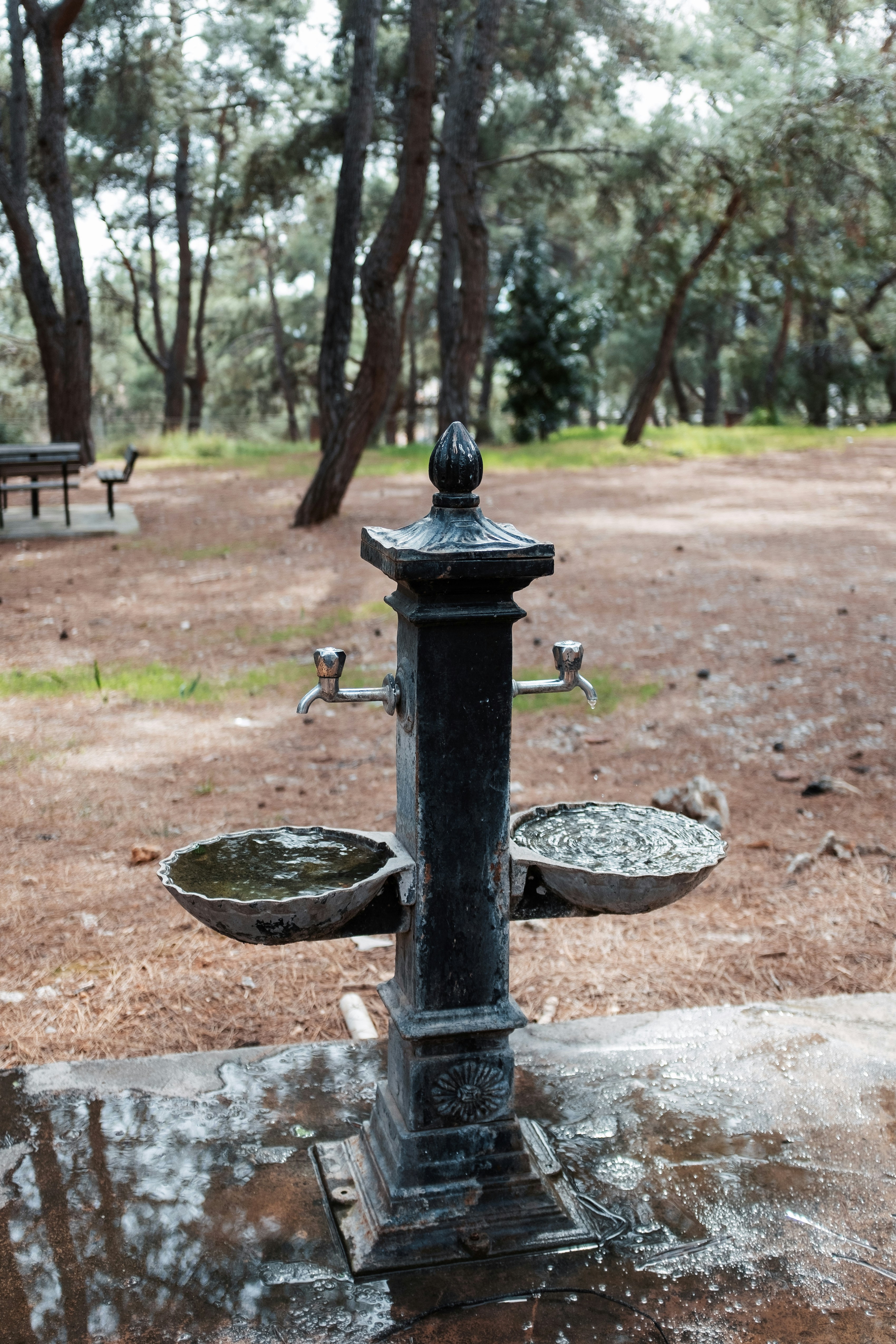 a metal scale sitting on top of a cement slab