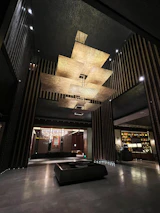 Interior shot of a modern office space finished with elegant joinery and gold accents.