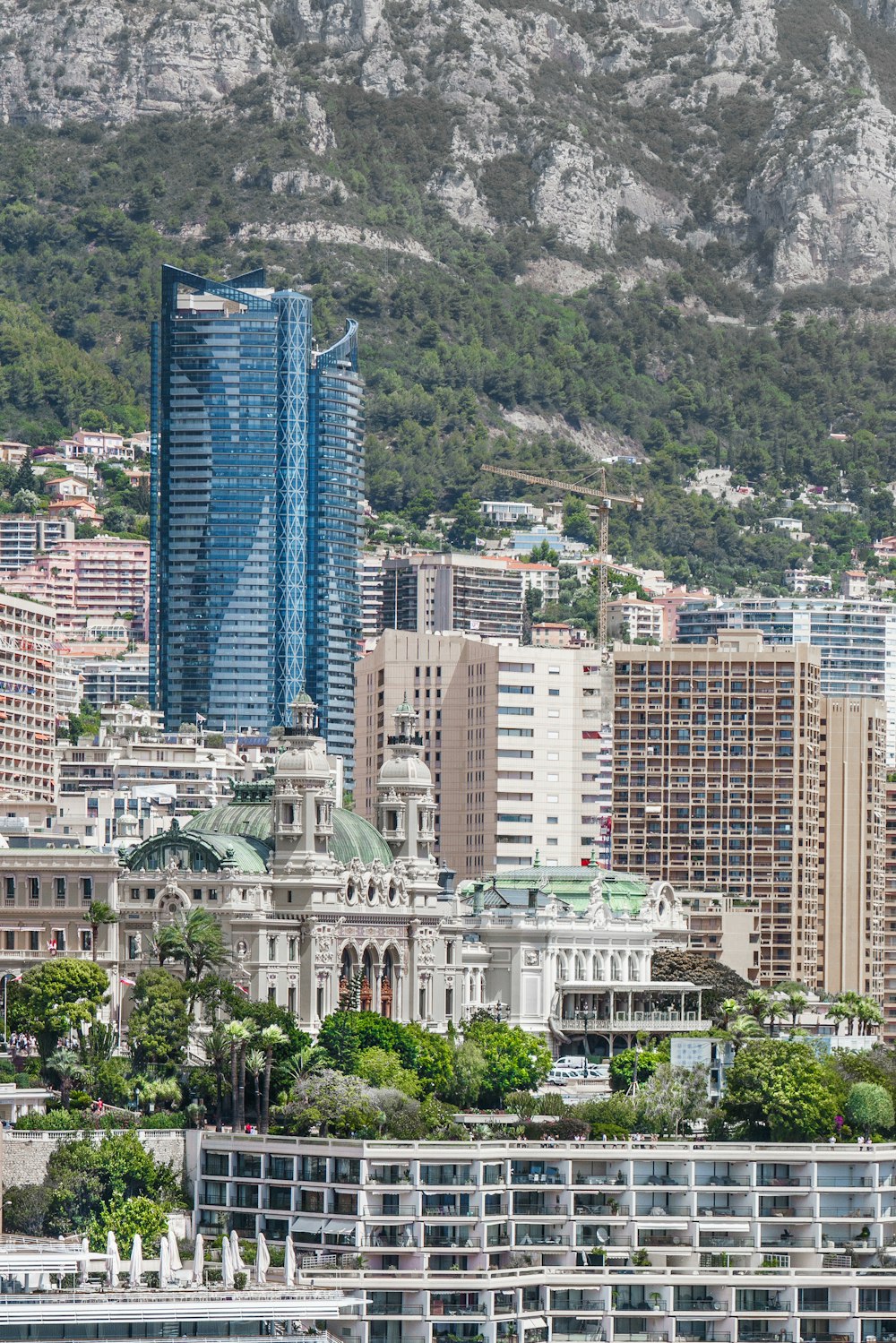 a view of a city with a mountain in the background