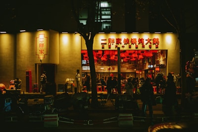 A vibrant restaurant scene with customers enjoying food delivery.