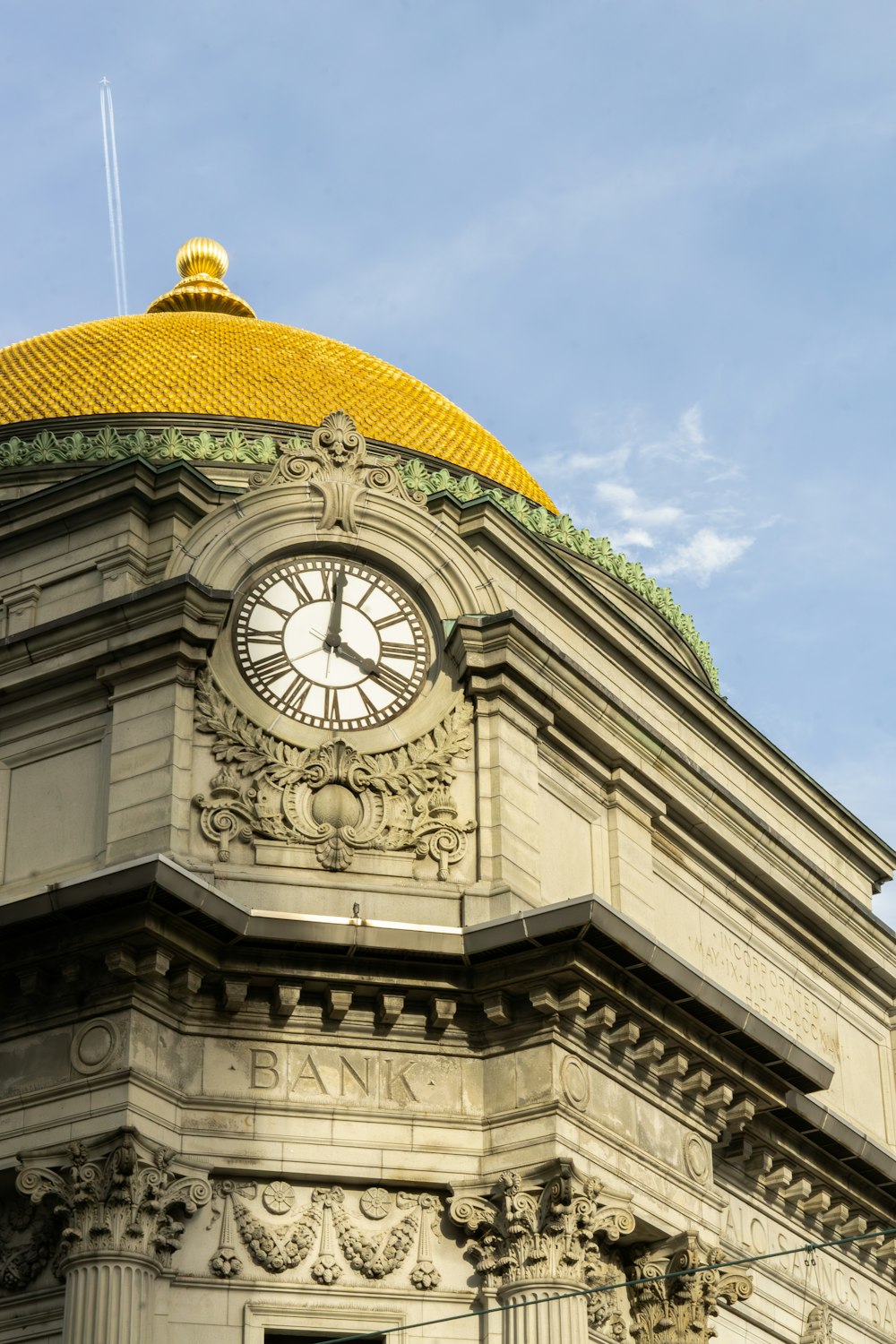 a large building with a clock on the top of it