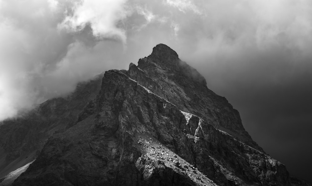 a black and white photo of the top of a mountain