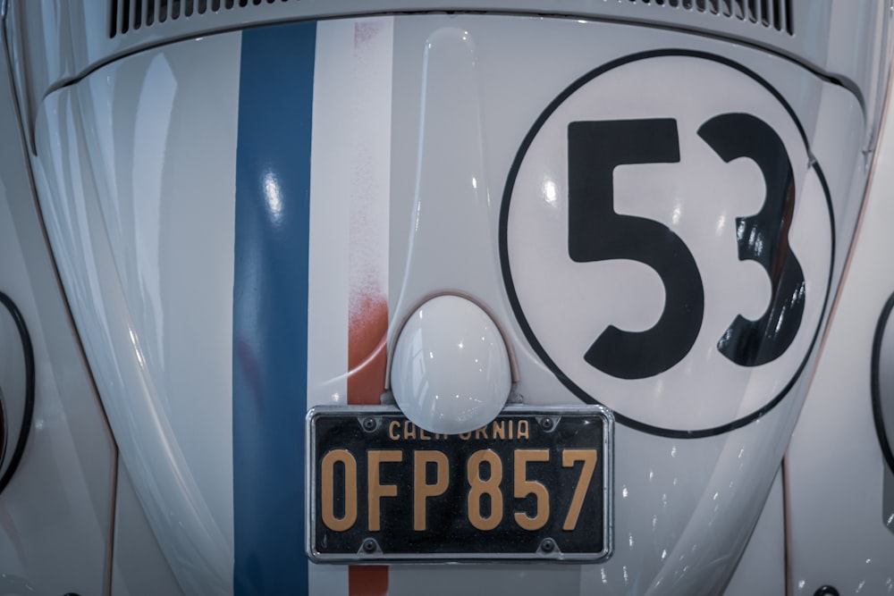 a close up of a number plate on a car