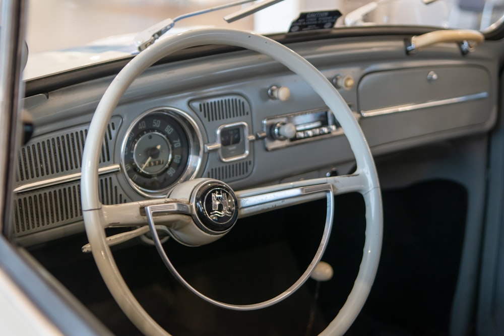 a steering wheel and dashboard of a car