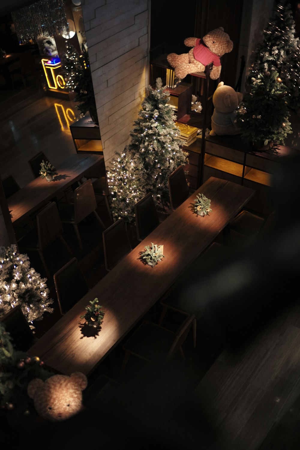 a long table with lights on it in a room