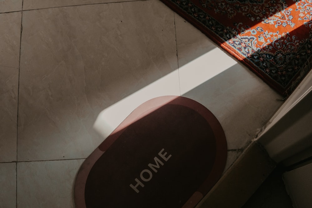 a close up of a sign on a tiled floor