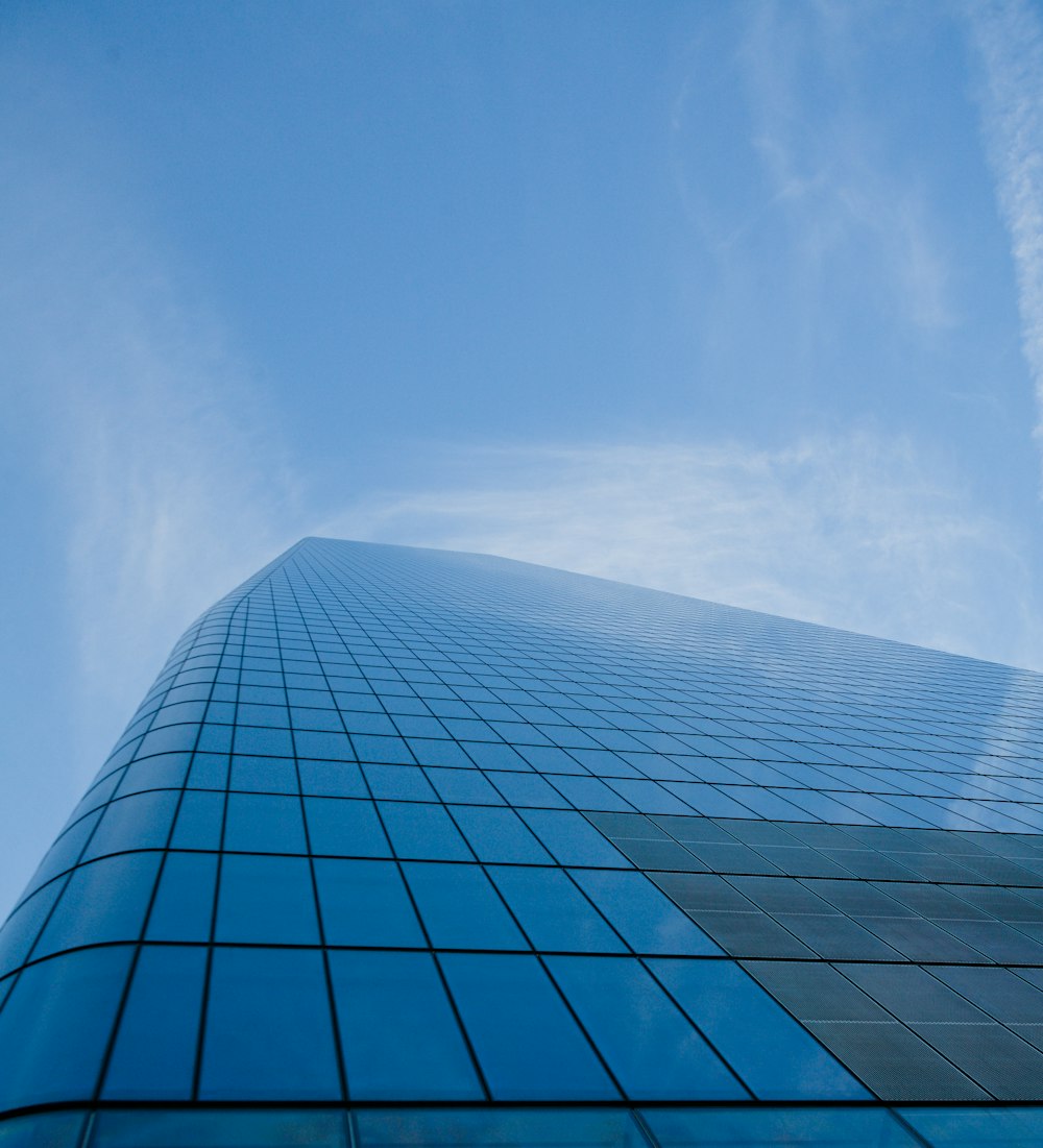 a very tall building with a sky in the background