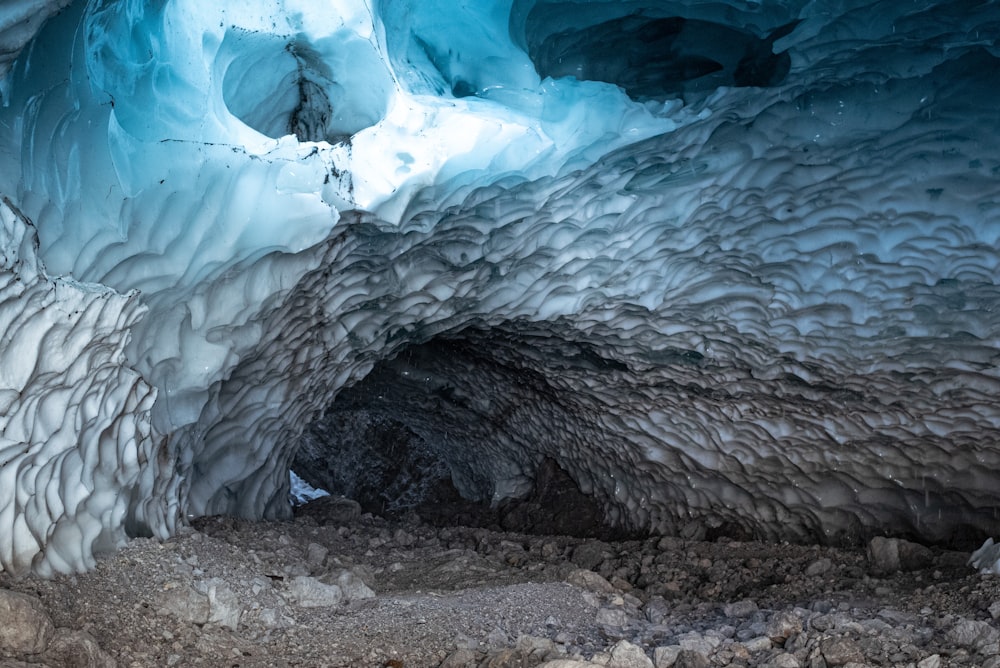a very large ice cave with some water inside