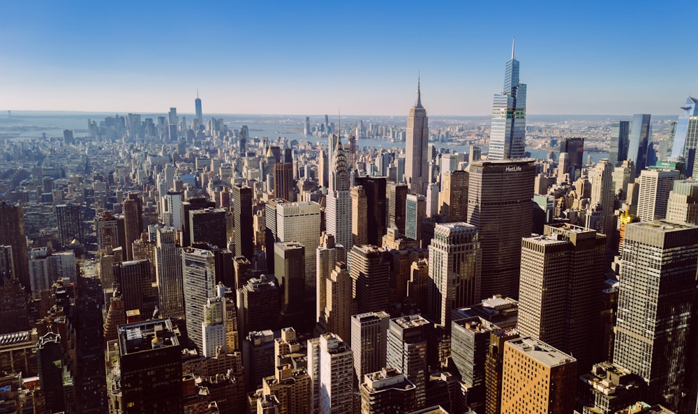 an aerial view of a city with tall buildings