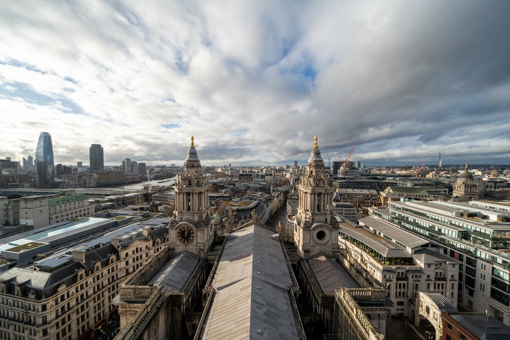 an aerial view of a city with tall buildings