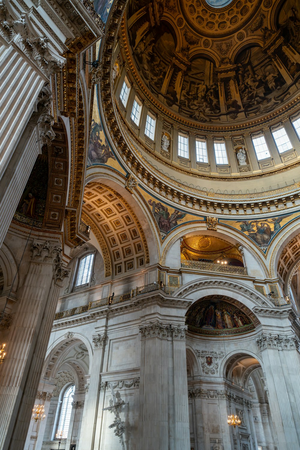 the interior of a church with a domed ceiling