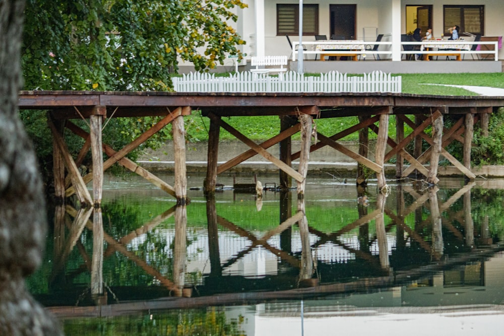 a wooden bridge over a body of water