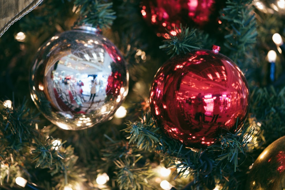 a close up of a christmas tree with ornaments