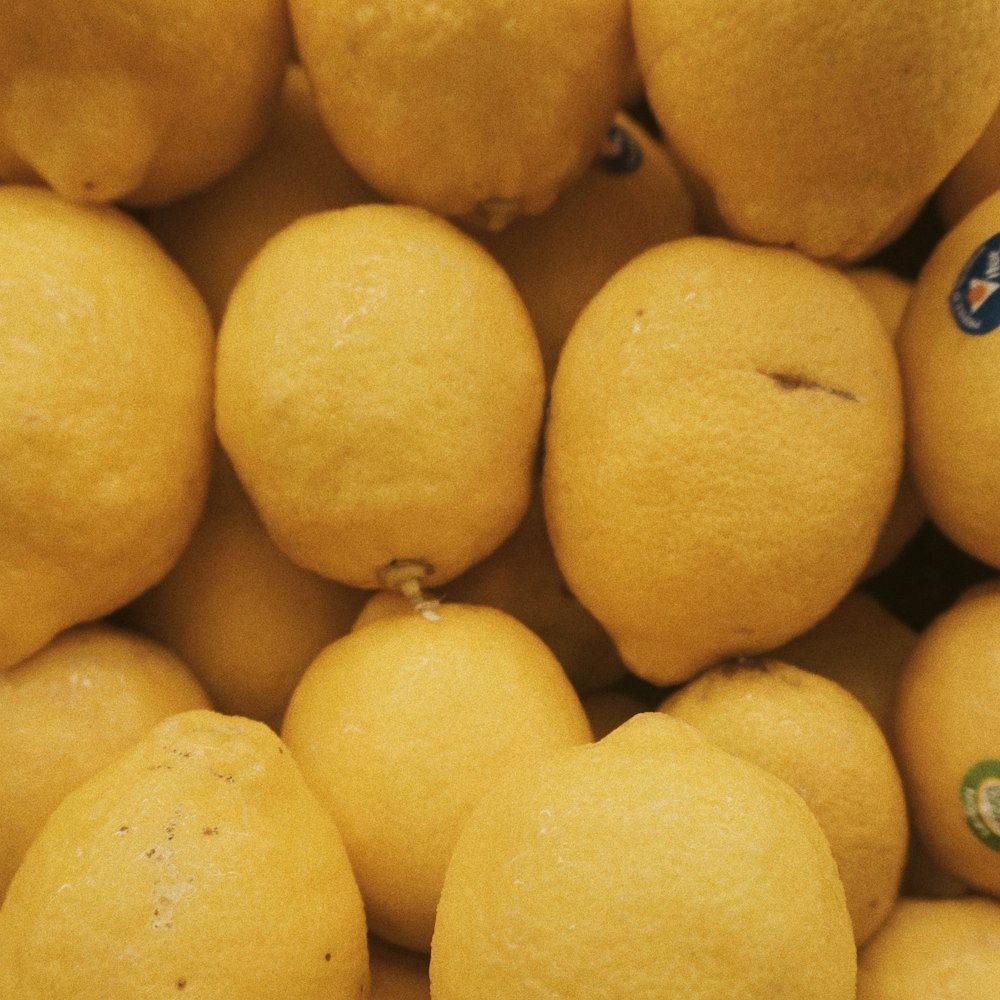 a pile of lemons sitting next to each other
