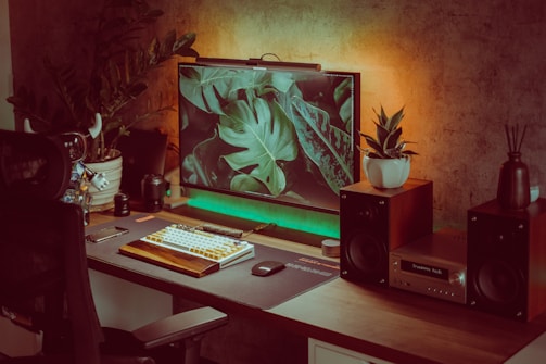 A serene workspace featuring plants and high-tech gadgets.