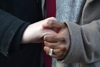 A warm handshake between two families sealing a match.