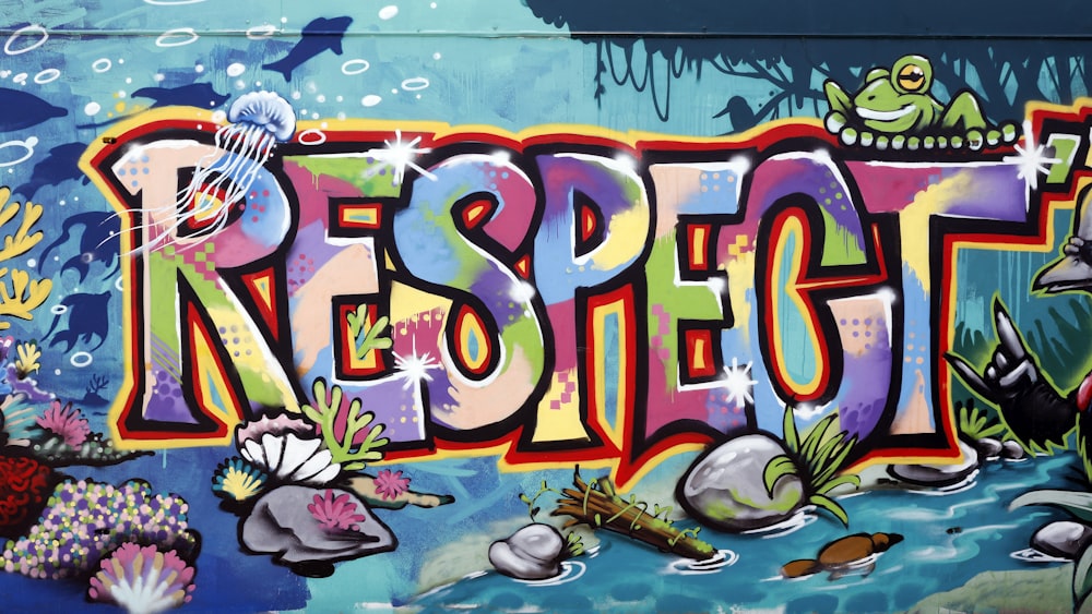 a colorful wall with the word respect painted on it