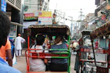 Vibrant street life and colorful rickshaws weaving through Dhaka.