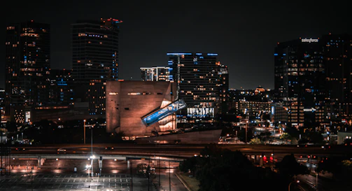Nighttime cityscape of Ankara highlighting Beytepe district with illuminated buildings.