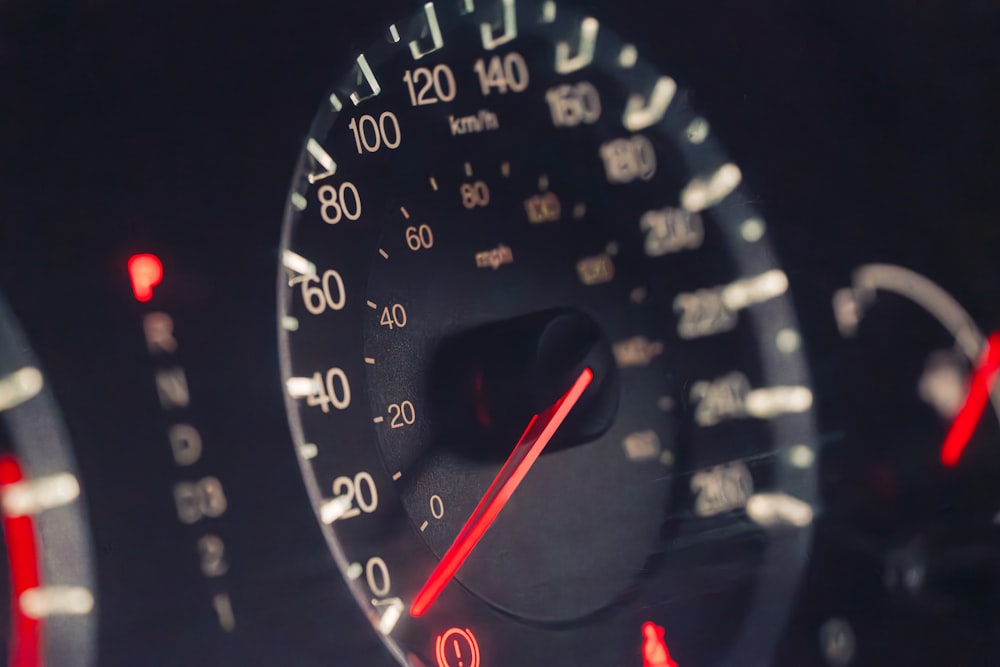 a close up of a speedometer on a car