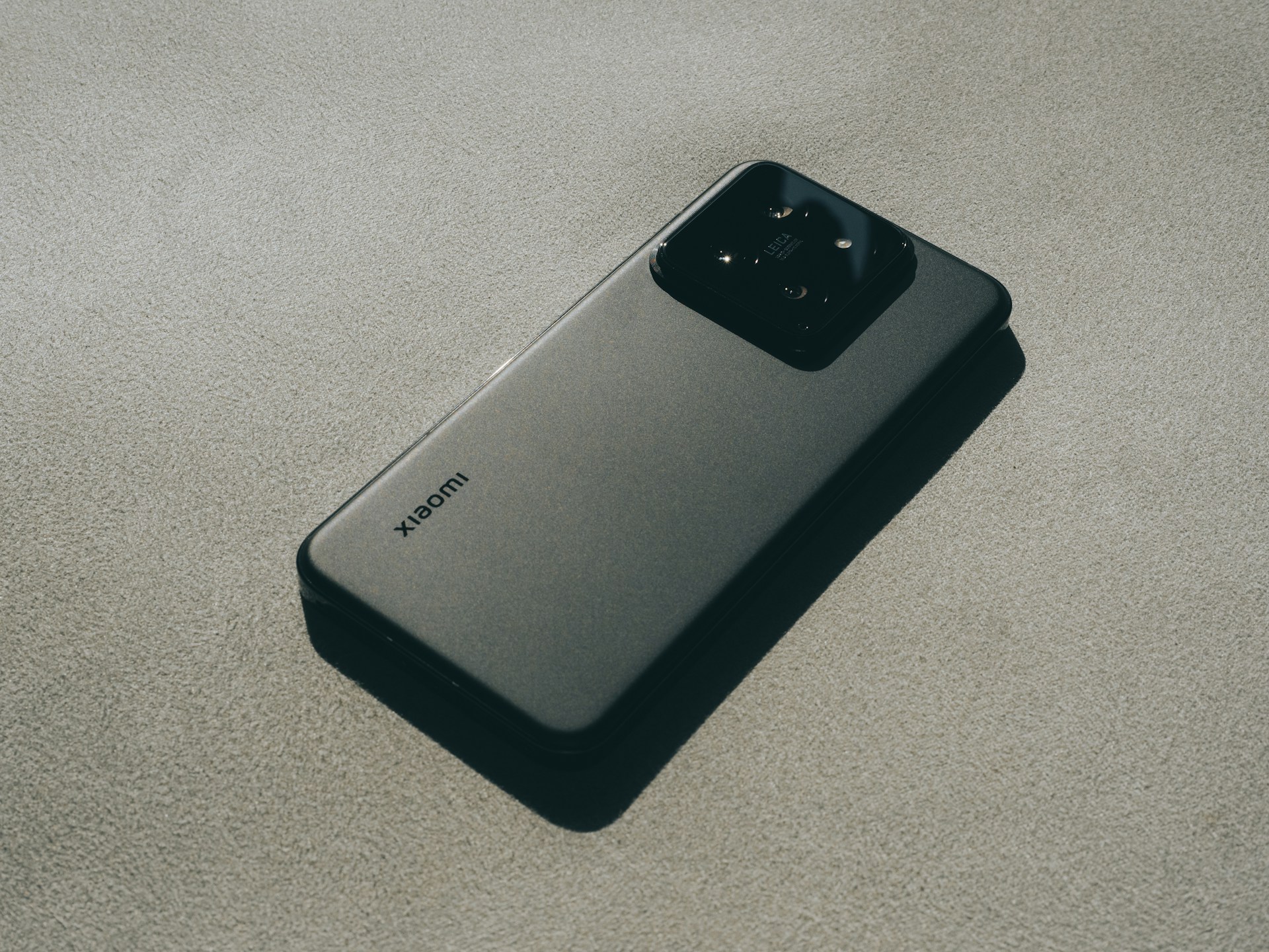 a close up of a cell phone on a surface
