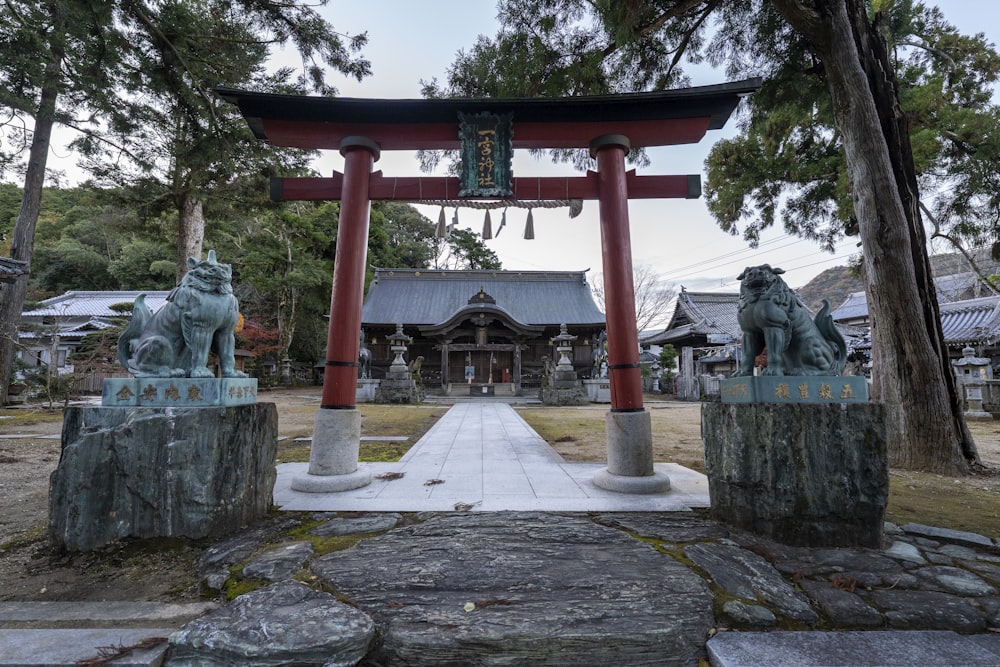 a statue of animals in front of a building