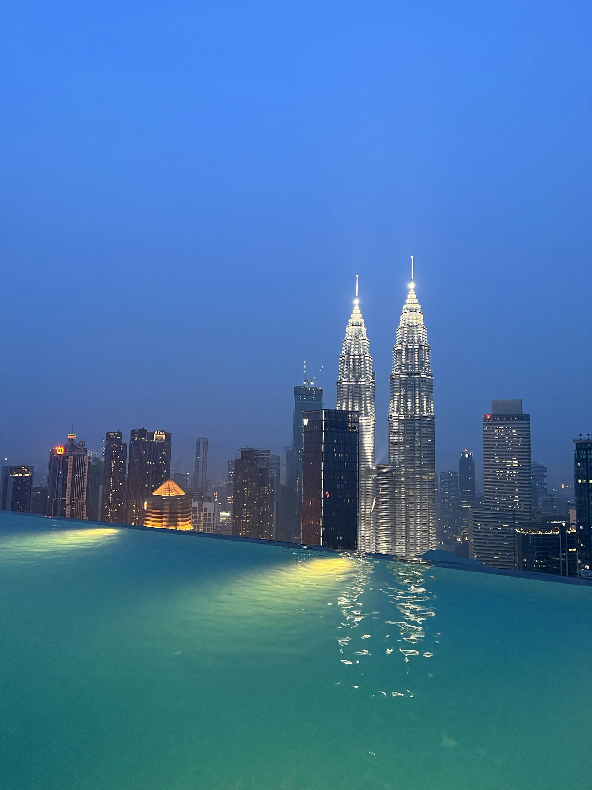woman wearing yellow long-sleeved dress under white clouds and blue sky during daytime