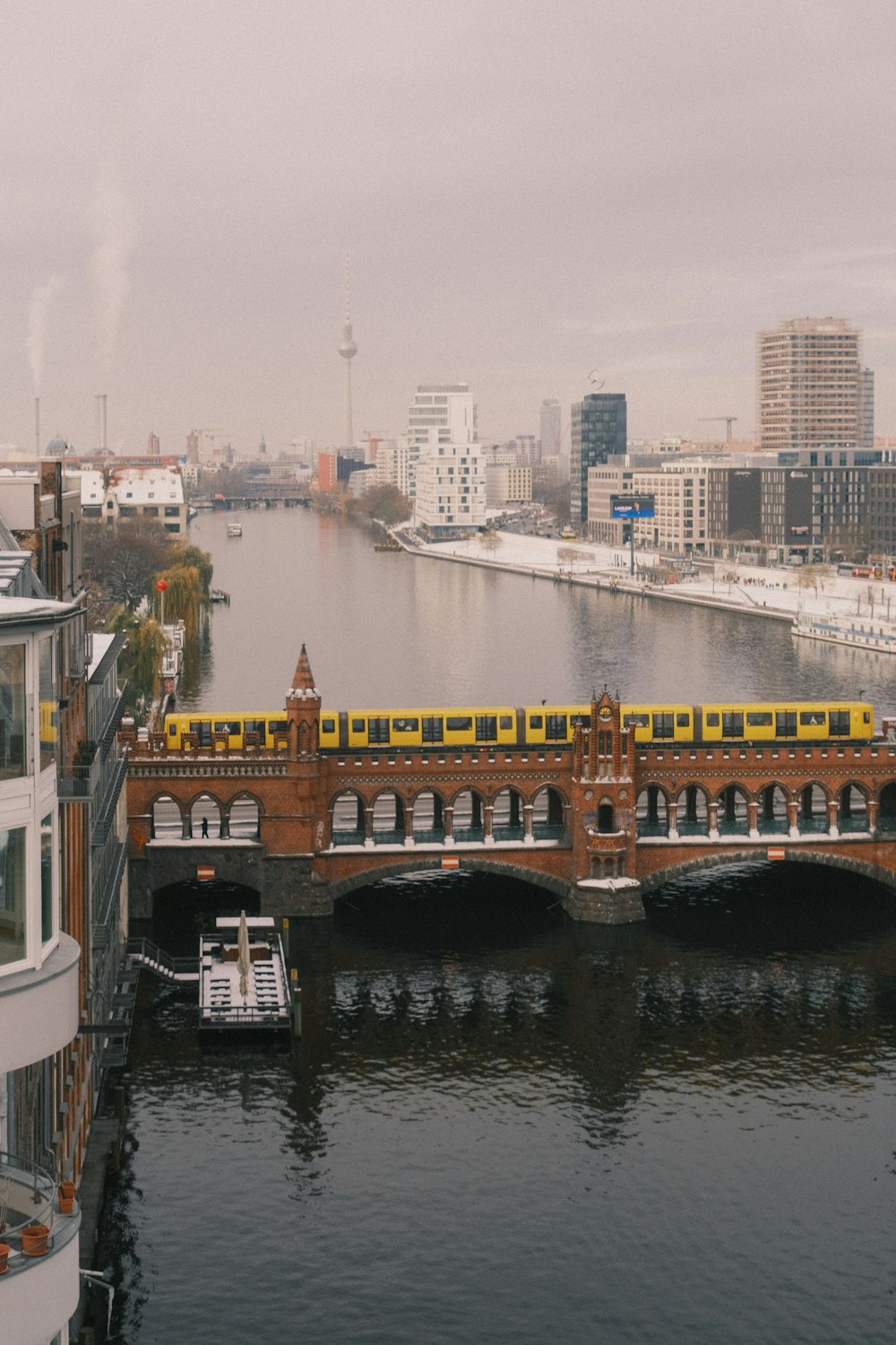 a train on a bridge over a body of water