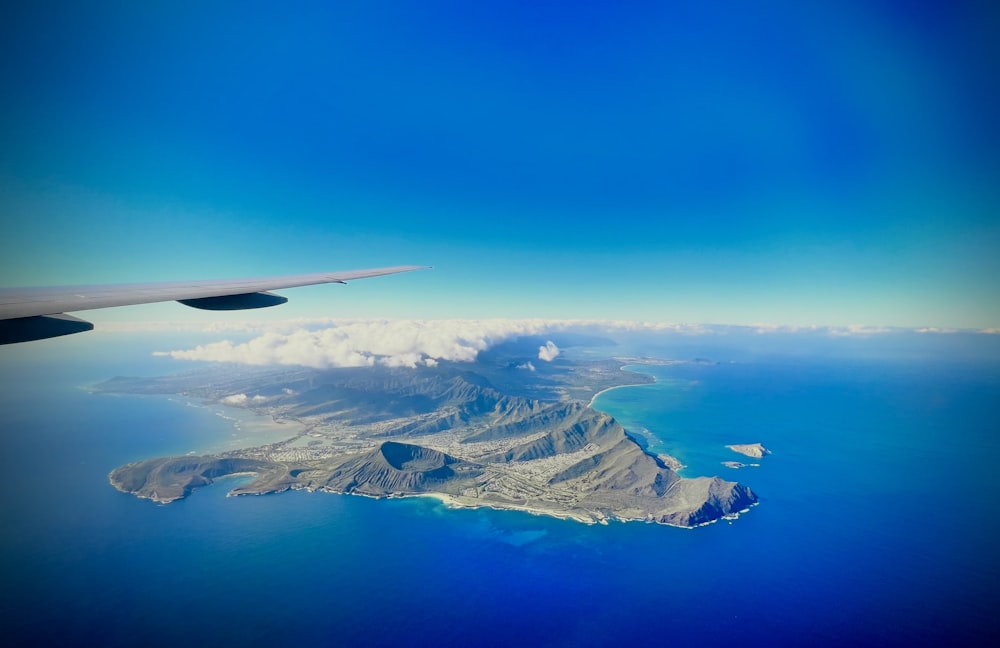 an aerial view of an island in the ocean